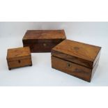 Two Victorian walnut brass bound writing boxes, the larger with inscribed brass shield plaque to the