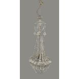 A cut glass five light chandelier, 20th century, with with baluster stem above glass drops and