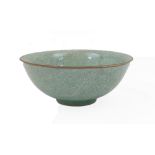 A Chinese crackle glazed celadon bowl, 20th century, approx. 24.7cm diameter With hairline cracks