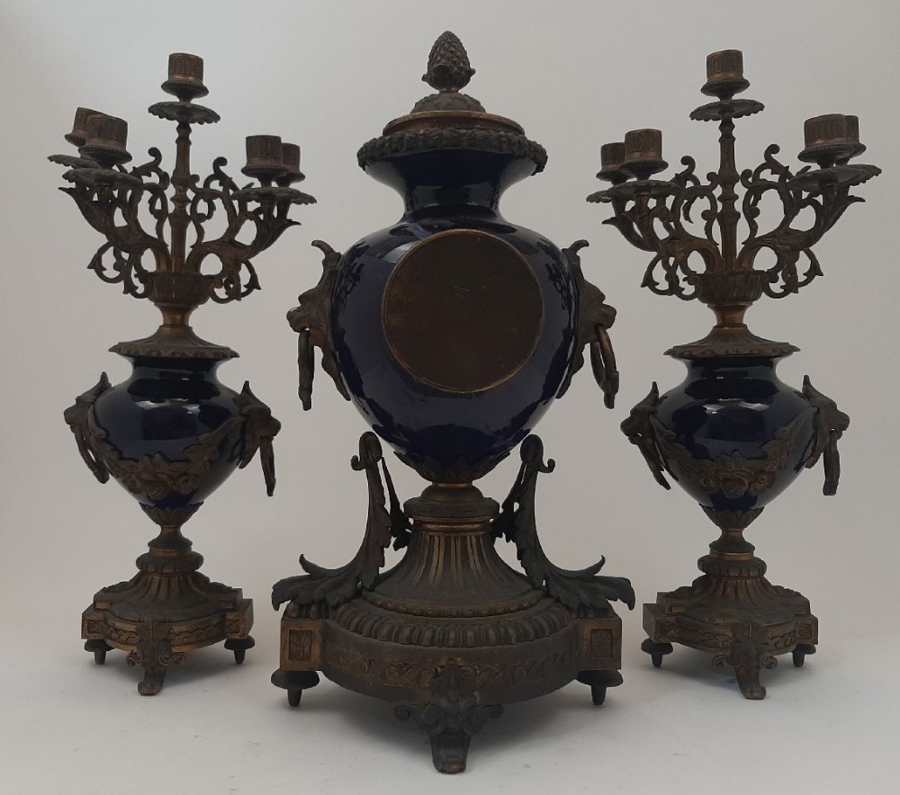 A French gilt-bronze mounted porcelain clock garniture, late 19th century, the case and garniture - Image 5 of 5
