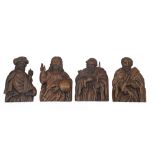 Four oak relief carved plaques, late 19th century, depicting Christ Pantocrator, and three other