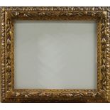 A Gilded Composition Bolognese Style Frame, early 20th century, with demi-fleur sight, with centre