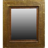 A Gilded Composition Cassetta Frame, late 19th century, with plain frieze and multiple ripples to