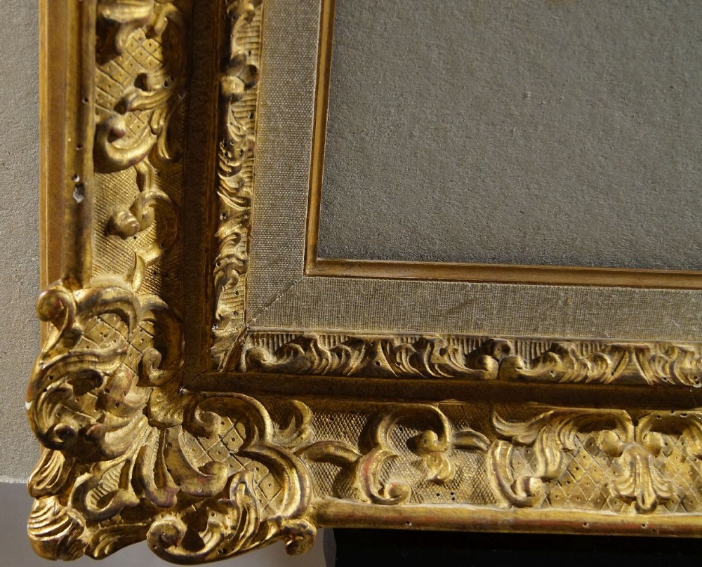 A Swiss Carved and Gilded Louis XIV Style Frame, late 20th century, with parcel gilded and linen - Image 2 of 4