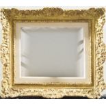 A Gilded Composition Louis XIV Style Frame, early 20th century, with leaf sight, taenia, sanded