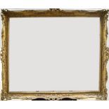 A Gilded Composition Louis XV Style Swept and Pierced Frame, early-mid 20th century, with cavetto