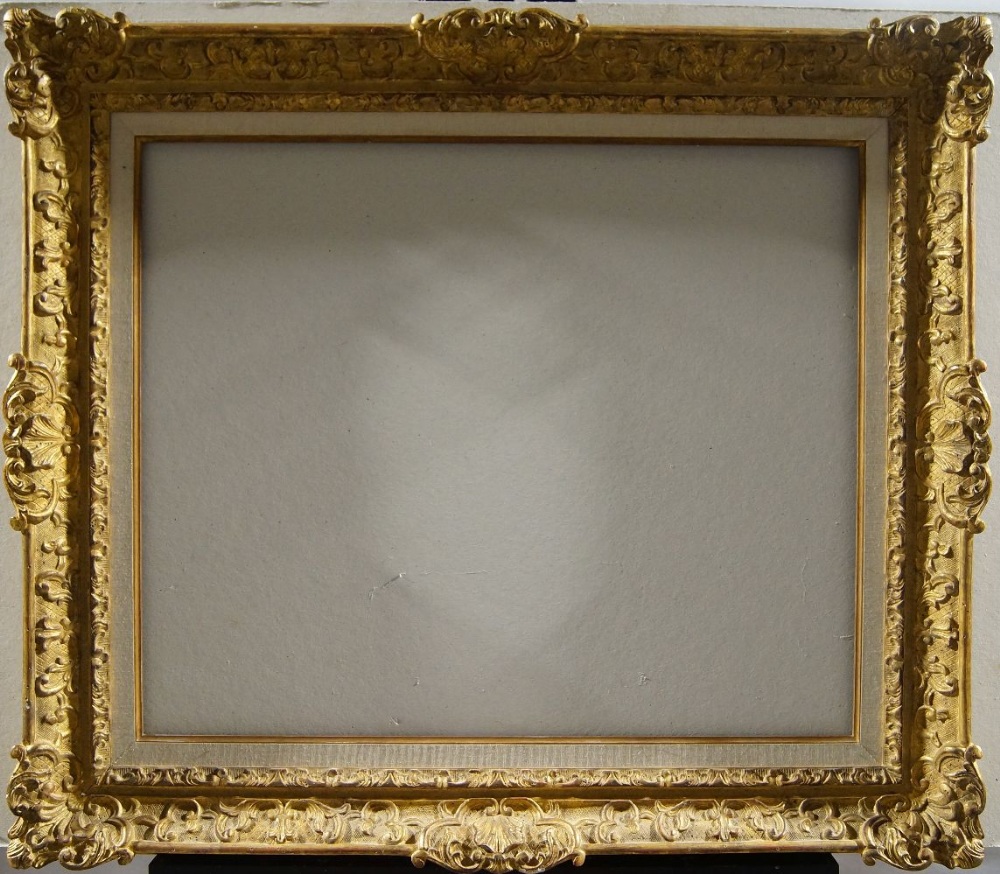 A Swiss Carved and Gilded Louis XIV Style Frame, late 20th century, with parcel gilded and linen