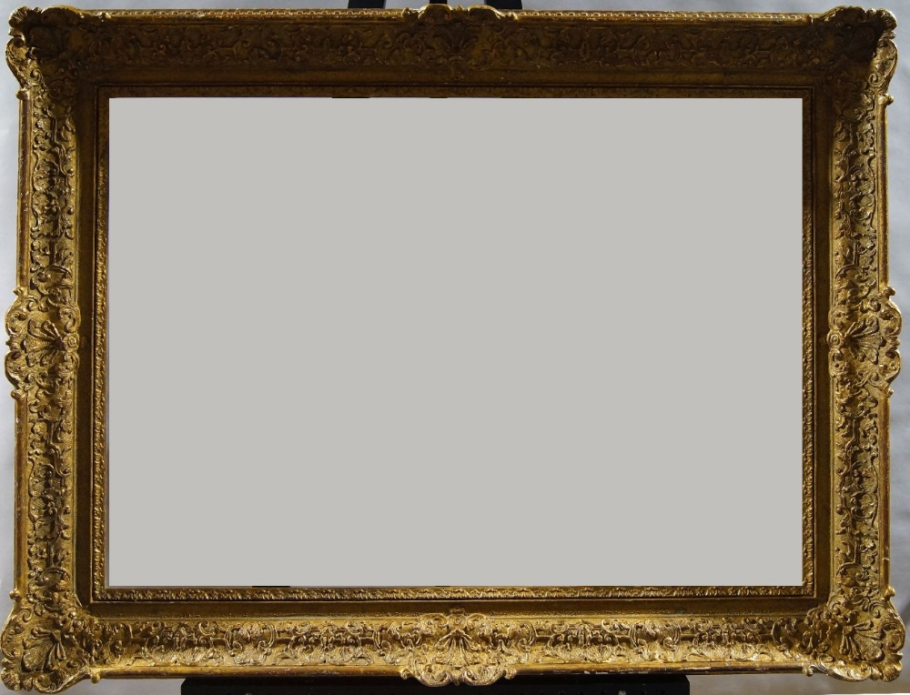 A Gilded Composition Louis XIV Style Frame, mid 20th century, with leaf sight, sanded frieze, the