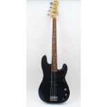 A Fender Precision Bass, made in Mexico, serial number MZ2031286, in soft Fender carry case, approx.