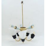 An Italian ten light brass chandelier, c.1950, with four glass shades and five egg shell enamelled