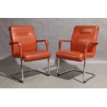 Poltrona Frau, a pair of cantilever armchairs, circa 1990, with vermillion leather seats on
