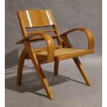 A satinwood and caned folding armchair, late 20th century, 80cm high, 64cm widePlease refer to