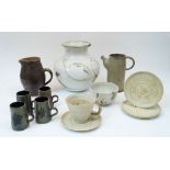 A group of studio pottery, 20th century, to include a Leach Pottery stoneware jug with brown