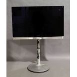 A Bang & Olufsen Beovision 7 television, with stand, no remote It is the buyer's responsibility to