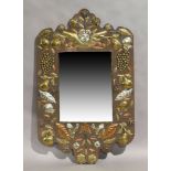 A continental brass and copper mirror, late 20th century, with various fruit and foliage decoration,