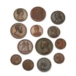 A collection of bronze medallions, to include: a Napoleon I example, obverse with profile bust of...