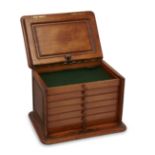 A Victorian mahogany tabletop collectors cabinet, c.1860, the hinged top inset with Gothic decora...