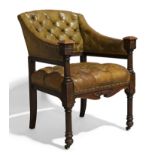 An oak library armchair