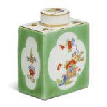 A Meissen porcelain green-ground rectangular tea caddy and a cover