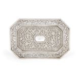 An elongated octagonal Kutch style tray with foliate scroll pierced border