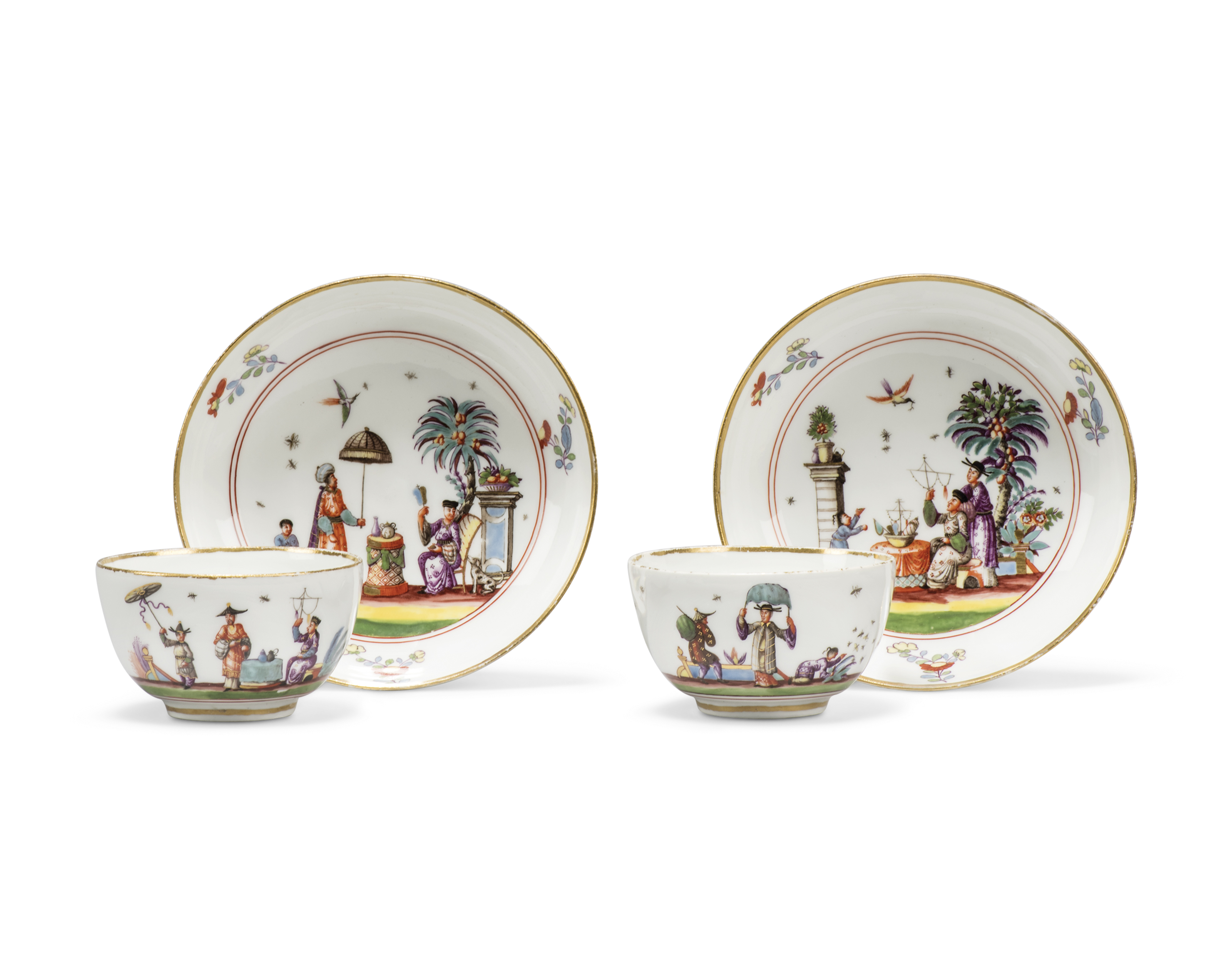 A pair of Meissen porcelain tea bowls and saucers, circa 1735, blue crossed swords marks, Drehers...