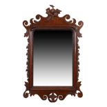 A George II mahogany fret cut wall mirror