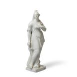 A Vienna white porcelain figure of Juno, c.1749, impressed shield mark, modelled standing holding...