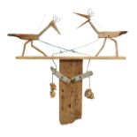 Robert Race, b. 1943, Two Birds, a wall mounted hand-operated pendulum toy, driftwood, metal, sto...