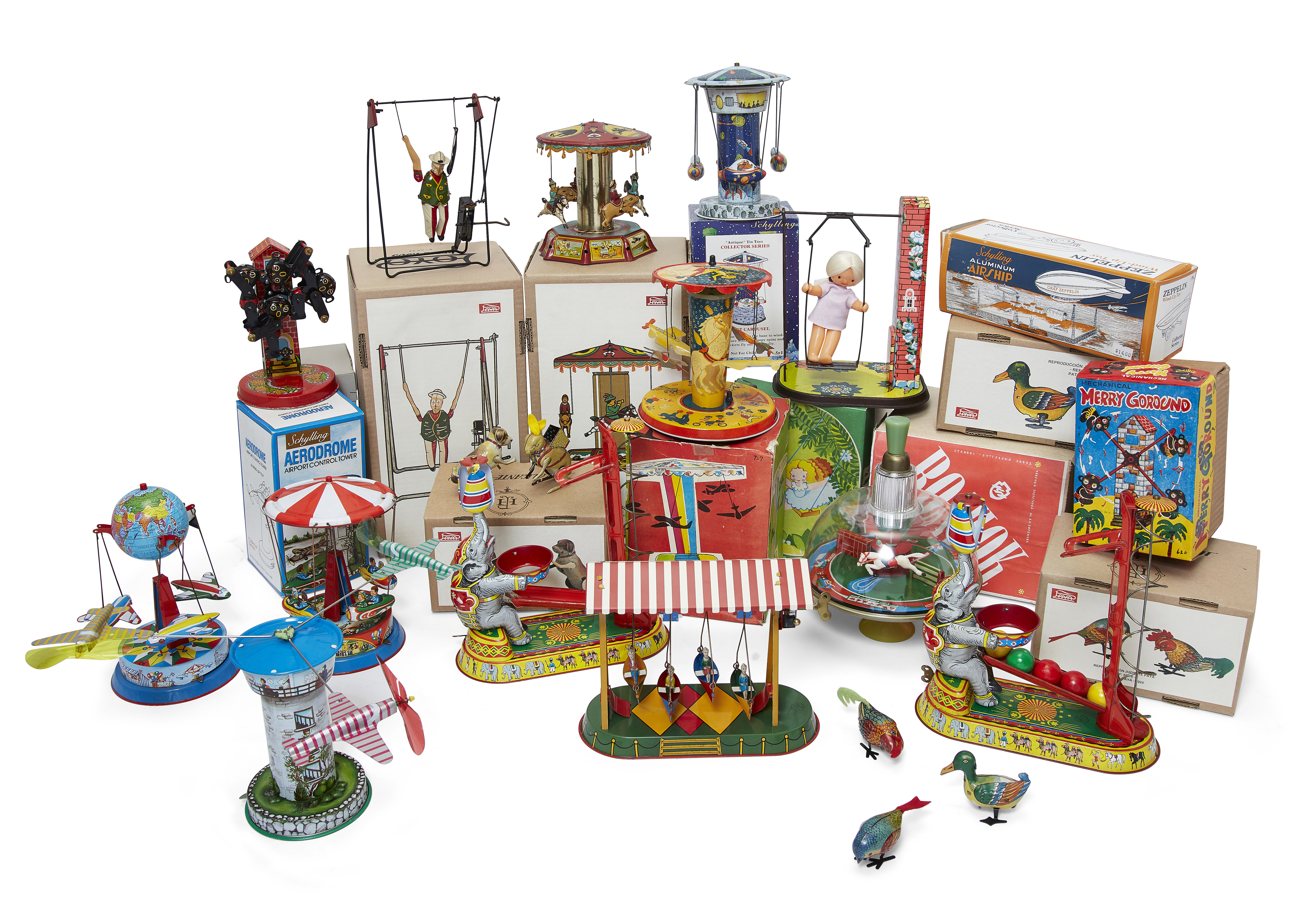 A quantity of mechanical tinplate toys