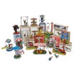 A quantity of mechanical tinplate toys