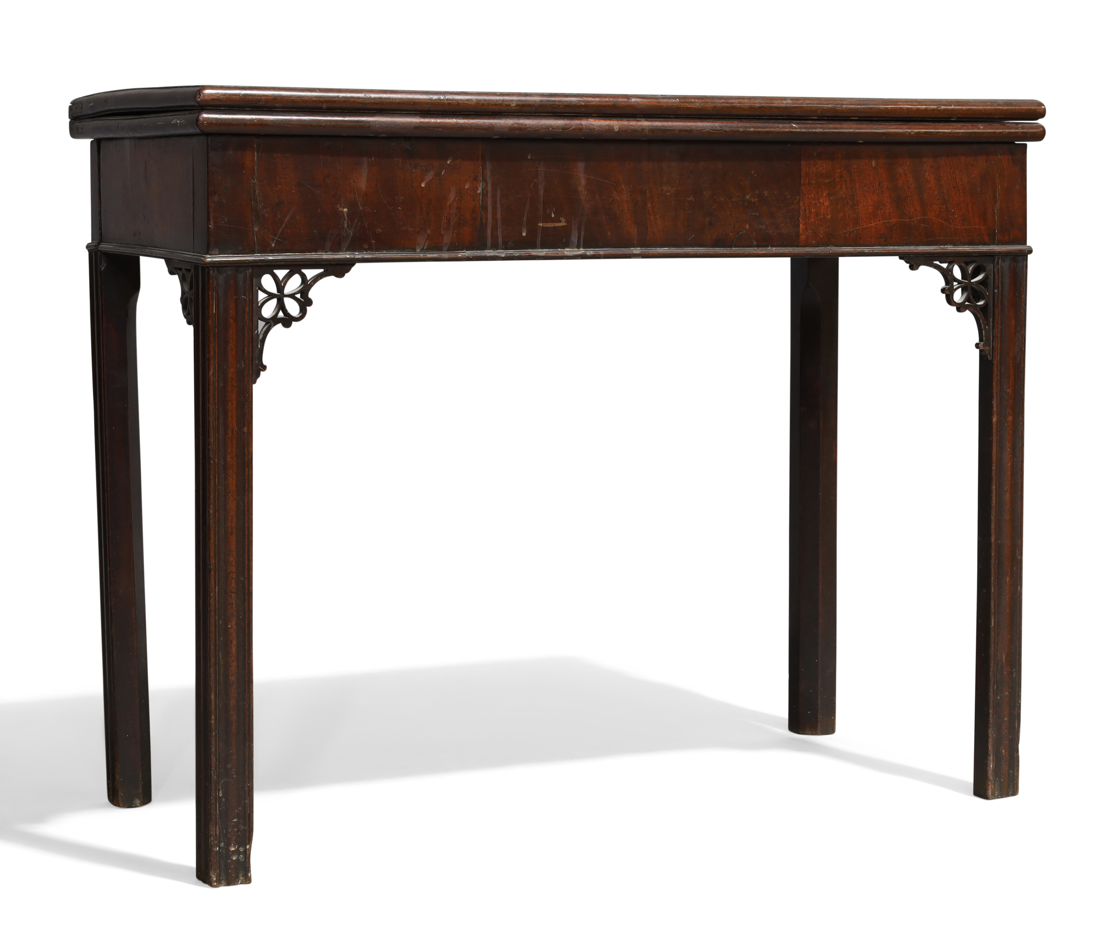 A George III mahogany card table, c.1770, the rectangular hinged top enclosing green felt baize, ...