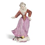 A Frankenthal porcelain figure of a lady, possibly a character from the Commedia dellArte, c.1756...