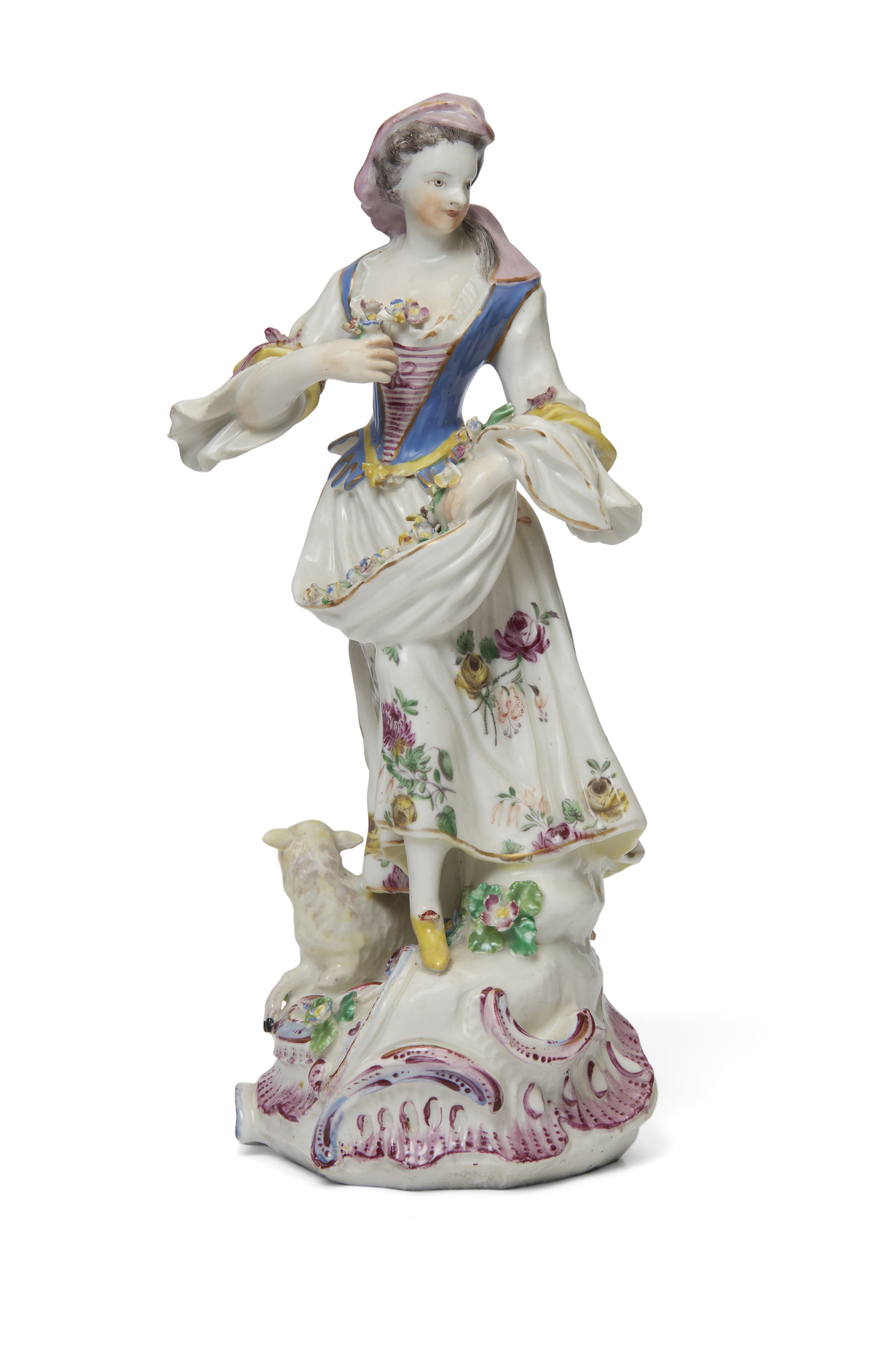 A Bow porcelain figure of a shepherdess, c.1757, modelled after the Meissen example, standing wea...