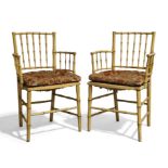 A pair of Regency painted simulated bamboo armchairs