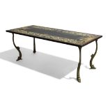 An Italian scagliola coffee table, 20th century, the rectangular slate top decorated with cherubs...