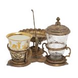 A German silver-gilt mounted porcelain and glass breakfast-set, first half 18th century, the silv...