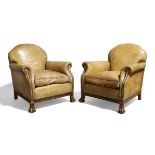 A pair of mahogany framed club armchairs