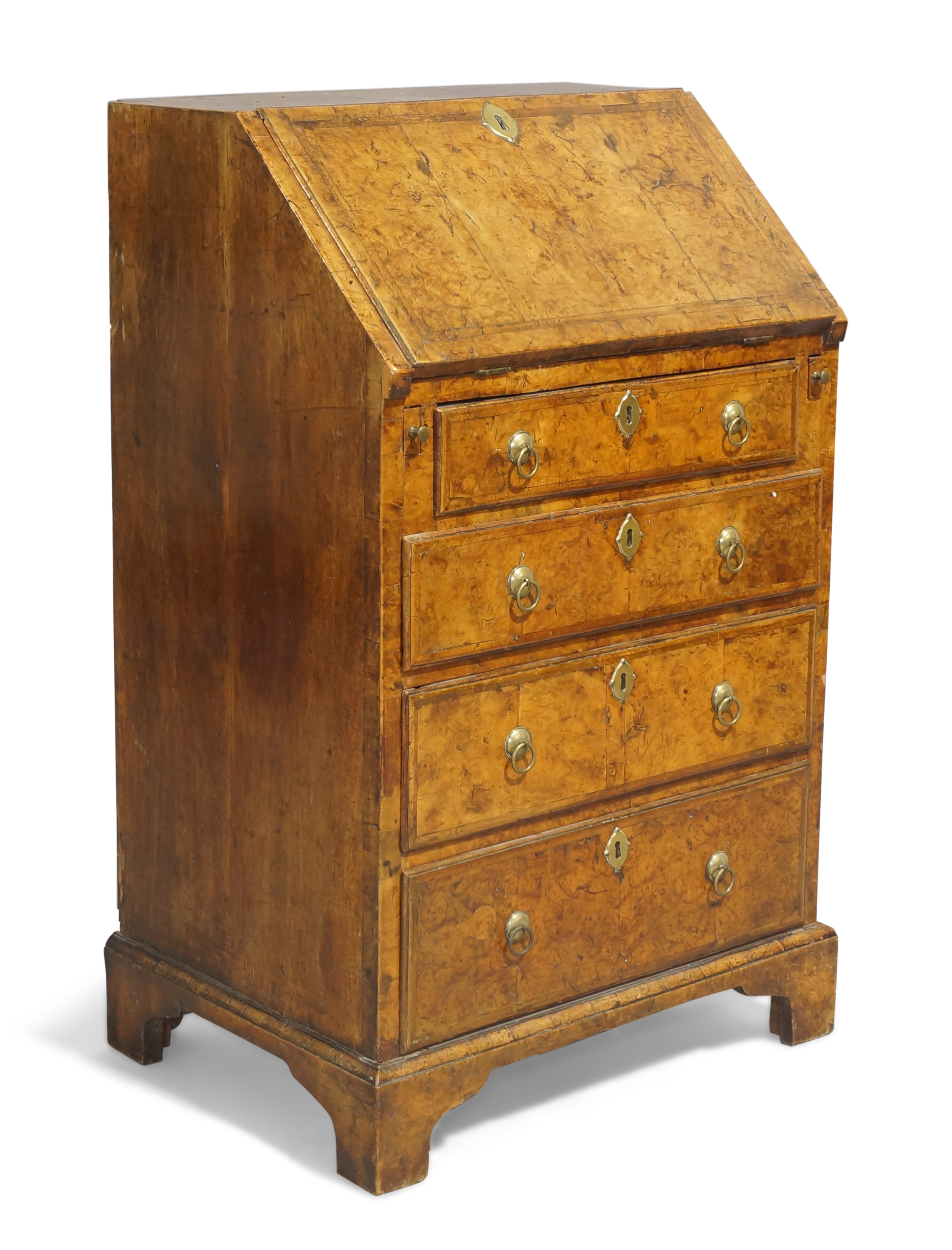 A George II walnut bureau, c.1740, of small proportions, the hinged fall front enclosing pigeon h...