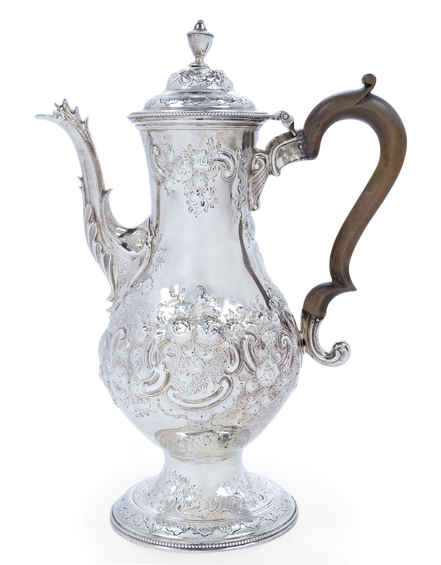 A George III silver coffee pot, London, 1783, John Kidder, of baluster form, the repousse floral ...