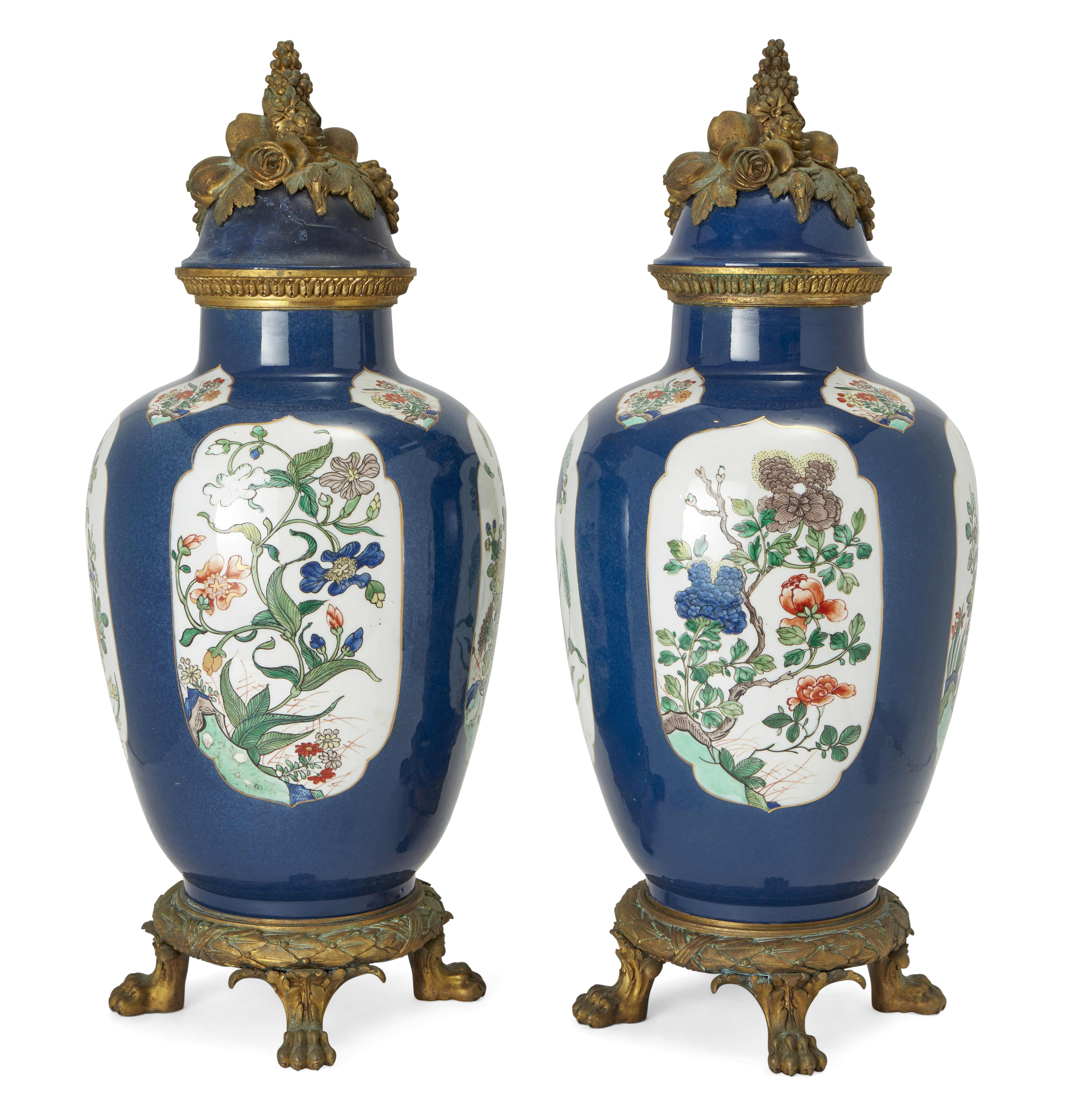 A pair of French Samson powder-blue ground famille verte jars and covers
