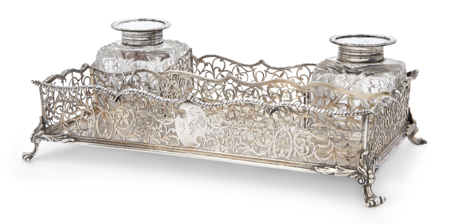 A Victorian silver gallery inkstand, London, 1896, Elkington & Co., of rectangular form, on four ...