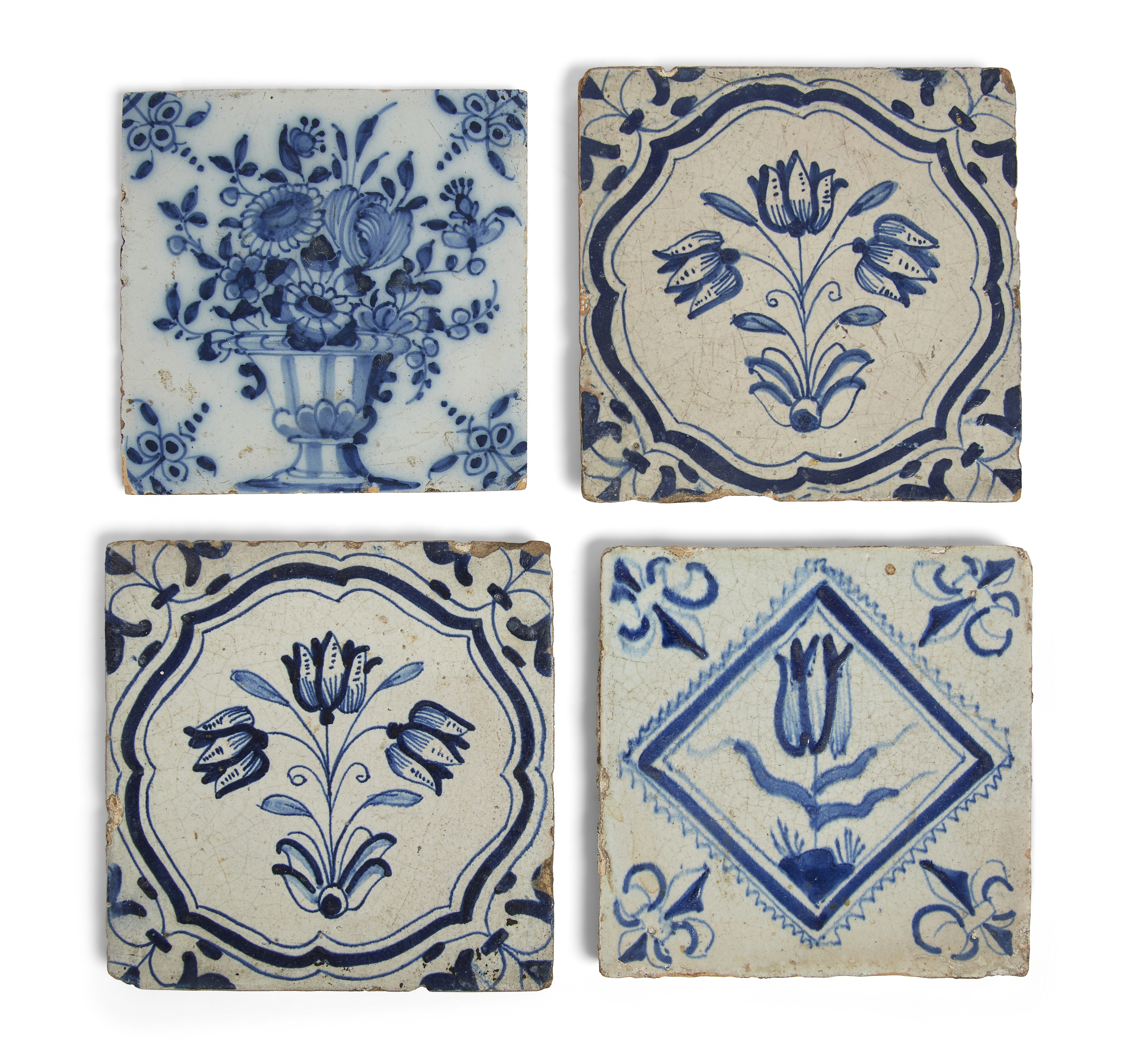 Four Dutch Delft blue and white tiles, three first half 17th century, one second quarter 18th cen...