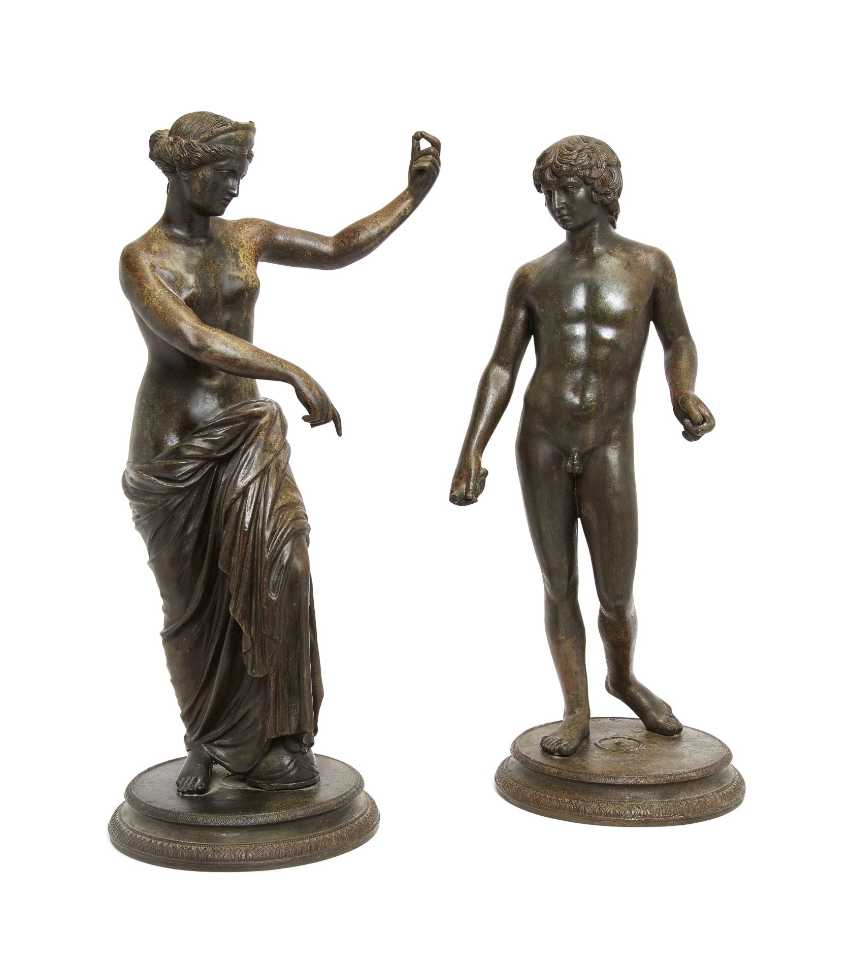 A pair of Neapolitan bronze figures of The Venus of Capua and The Antinous Farnese, after the Ant...