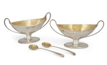 A pair of George III silver salts, London, 1790, James Young, each boat-shaped salt designed with...