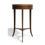 A Regency rosewood jardinière stand, c.1820, ivory inlaid, the circular top raised on square tape...