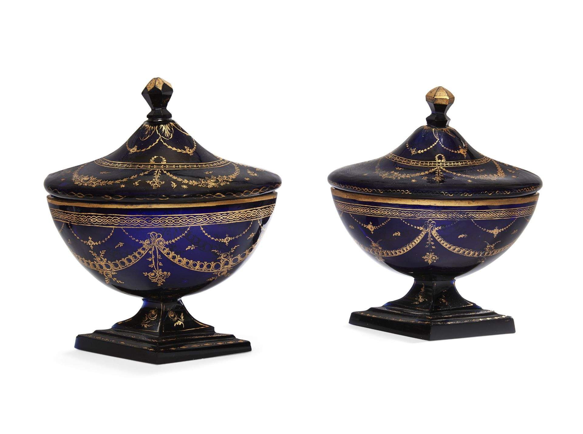 A pair of late George III blue-glass navette-shaped dishes and covers