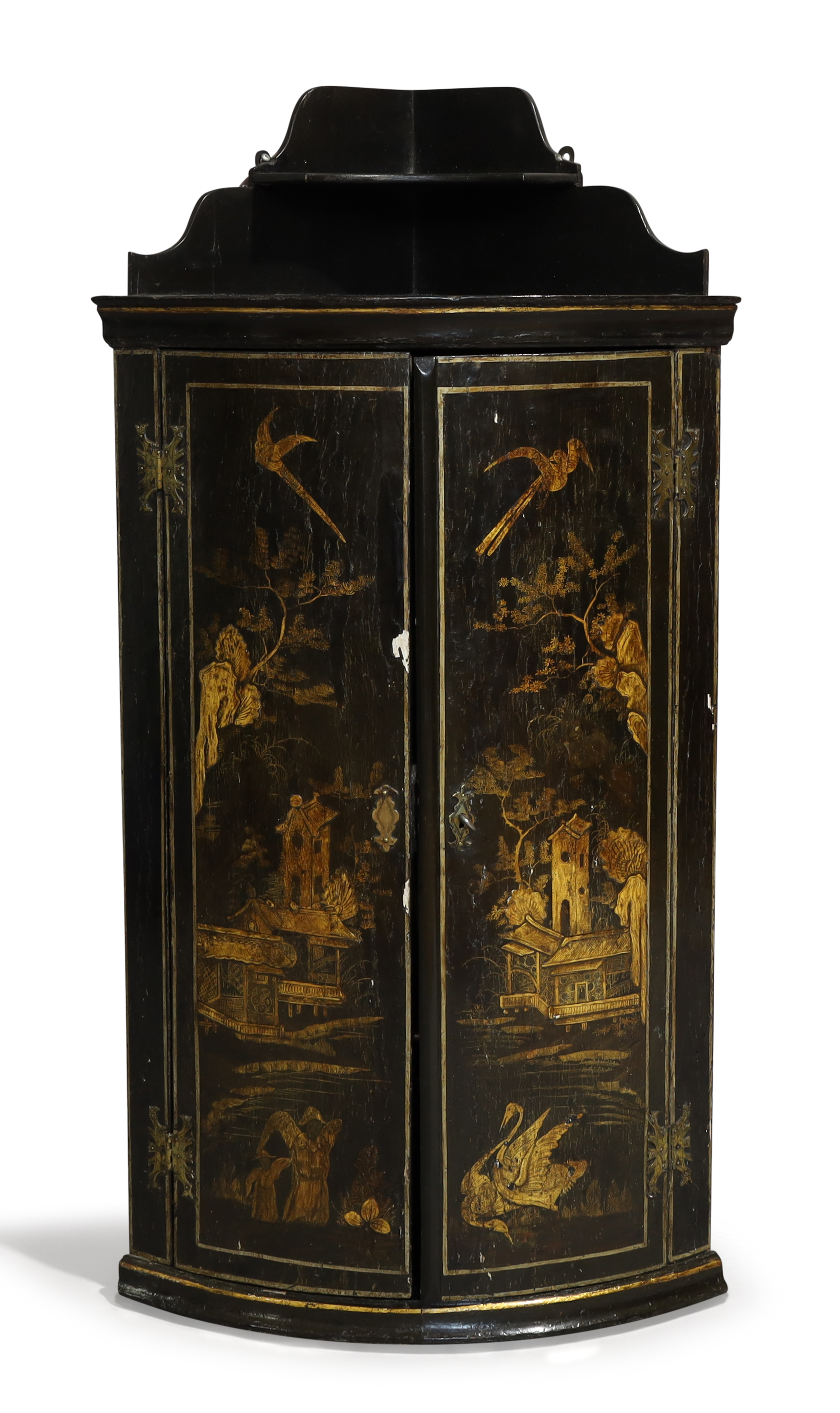A Queen Anne black japanned bowfront hanging corner cupboard