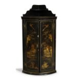 A Queen Anne black japanned bowfront hanging corner cupboard