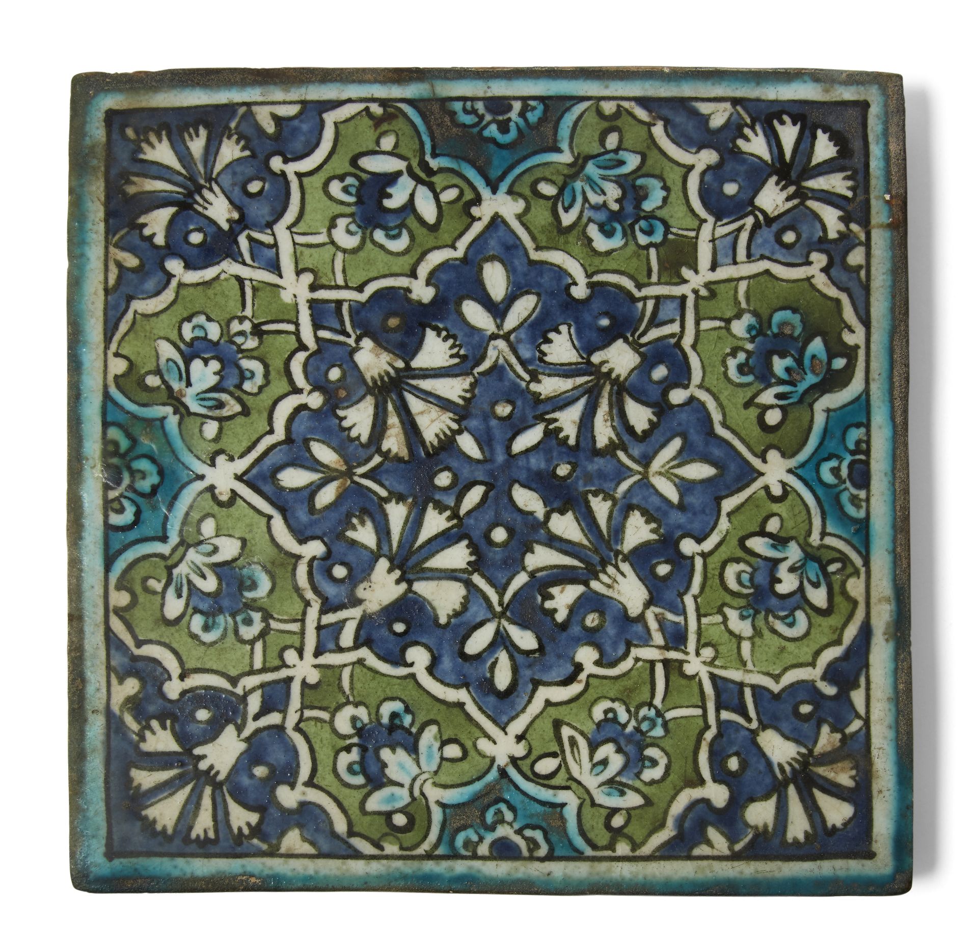 A Damascus Iznik square tile, 17th century, underglazed painted in green, cobalt and turquoise, w...