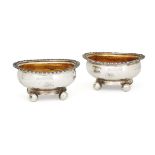 A pair of provincial silver salts, Newcastle, c.1830, Thomas Wheatley, of oval form with gilded i...